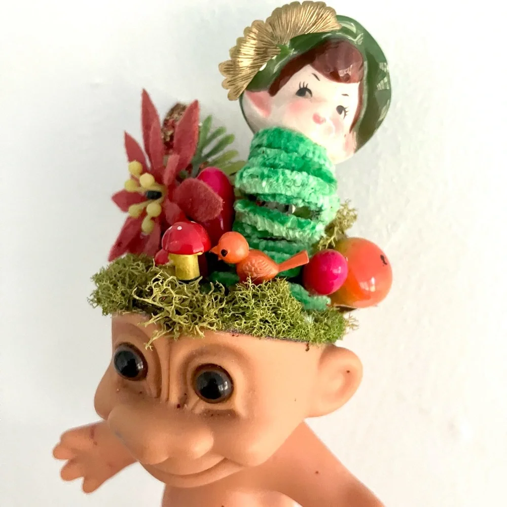 Vintage elf in a troll head handmade Christmas diorama vignette assemblage